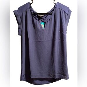 Fortune + Ivy Blue Blouse with a crisscross V opening in front.